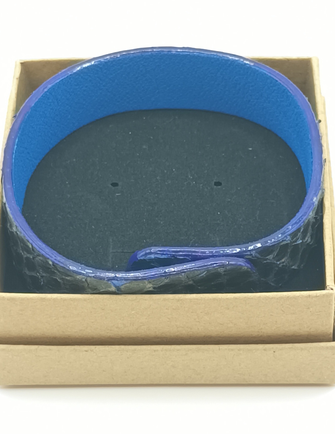 Bracelet bleu aux reflets bronze en saumon