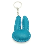 Porte-clés lapin fleuri pastel et bleu lagon