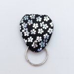 Étui à médiator Noir à petites fleurs argent